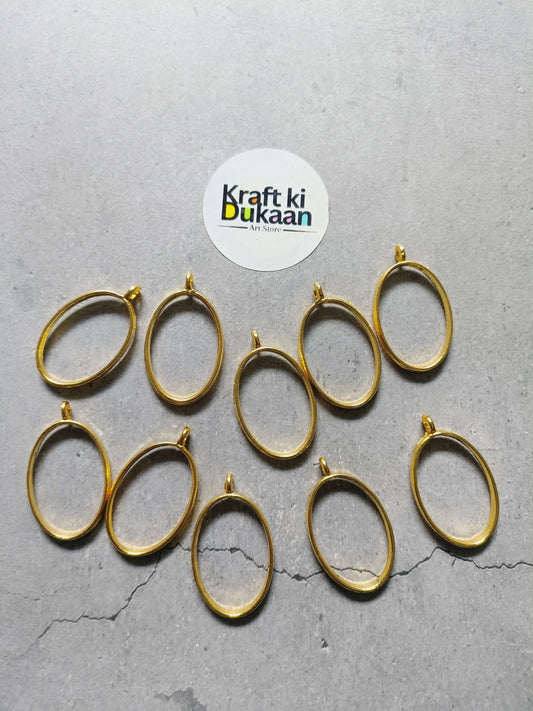 Gold oval bezel pendant set of 10, plain linked frames with small eye hooks