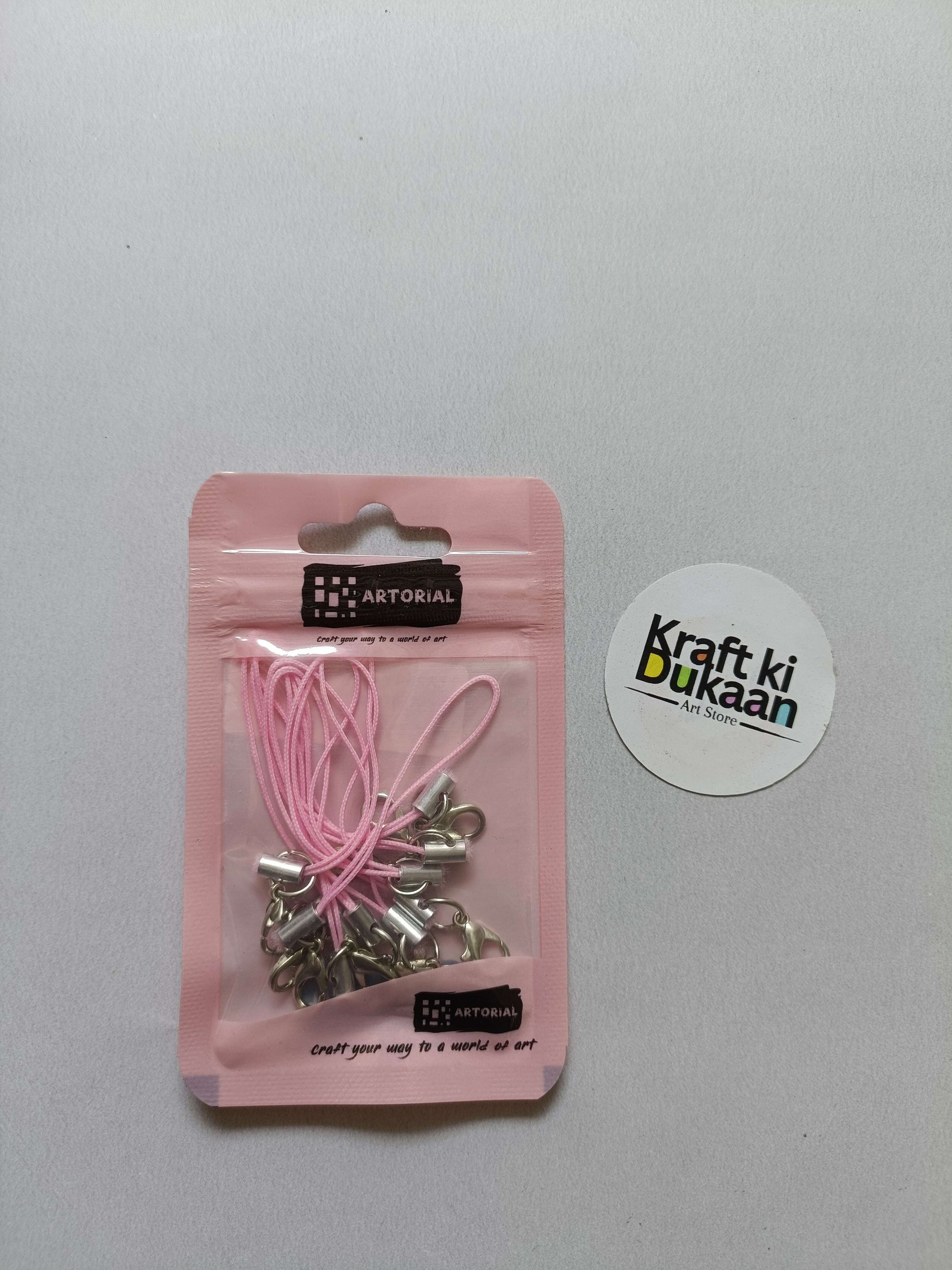 Pink rope keychain set with silver lobster clasps, packaged in pouch