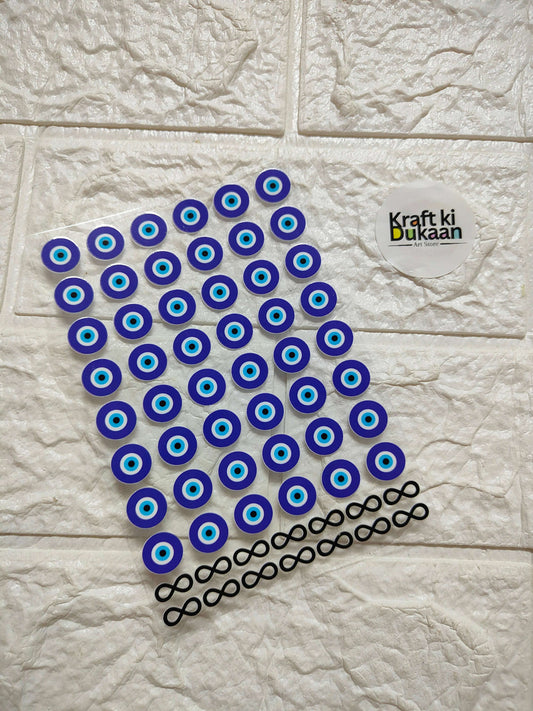 UV DTF peel-off sticker sheet with blue-and-white eye circles and black linked pattern