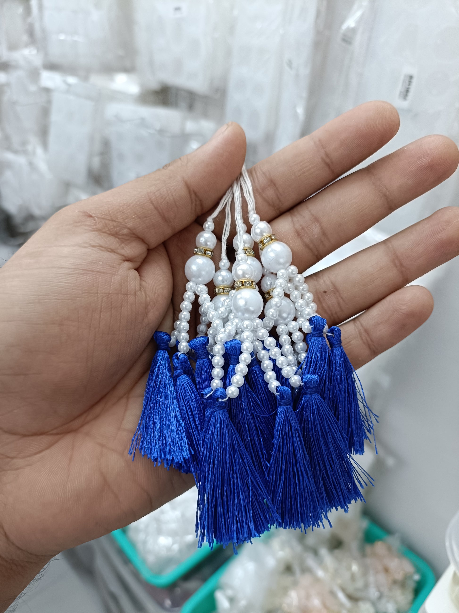 Beaded pearl latkan tassel bunch with blue silk tassels and white bead fringes