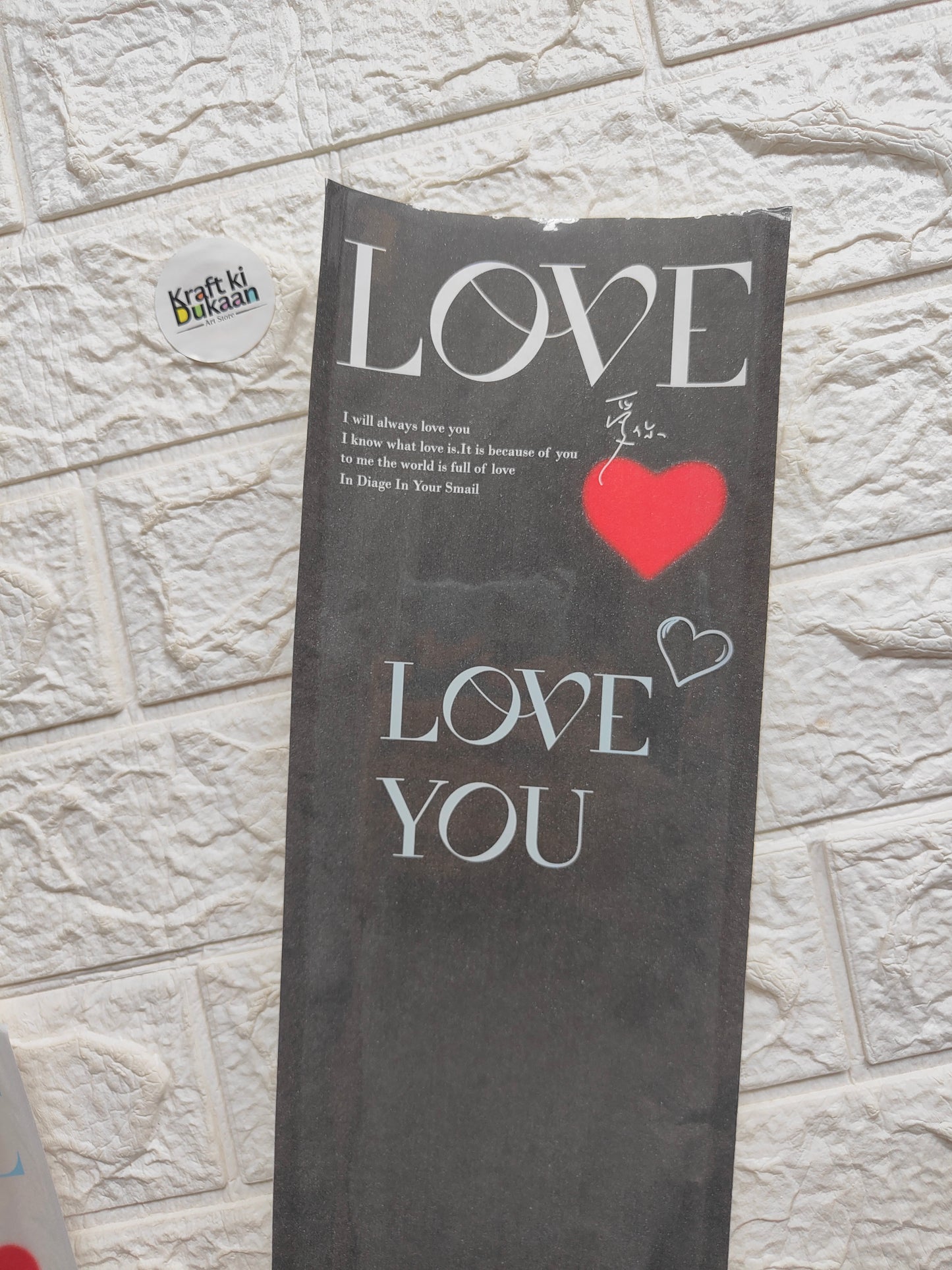 Black 14x40cm gift cover with “LOVE LOVE YOU” text and red heart graphic