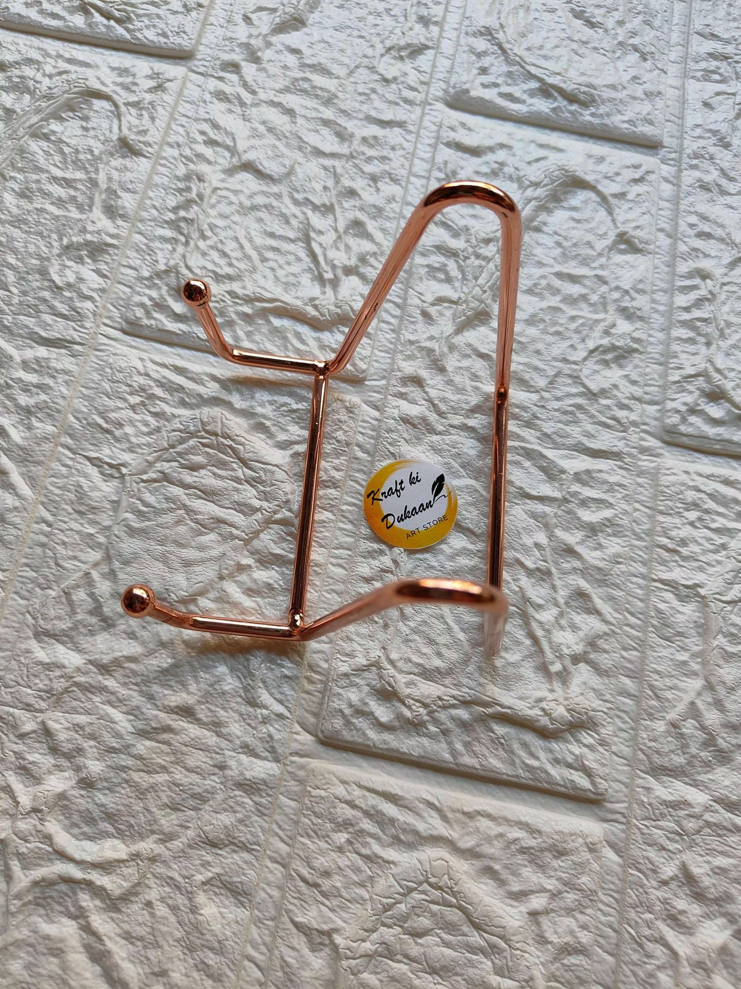 rose-gold-metal-stand-for-art-display-large-stand-angled