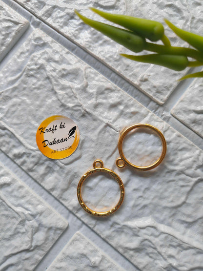 Round bezel pendant loops in gold tone, with small top eyelets