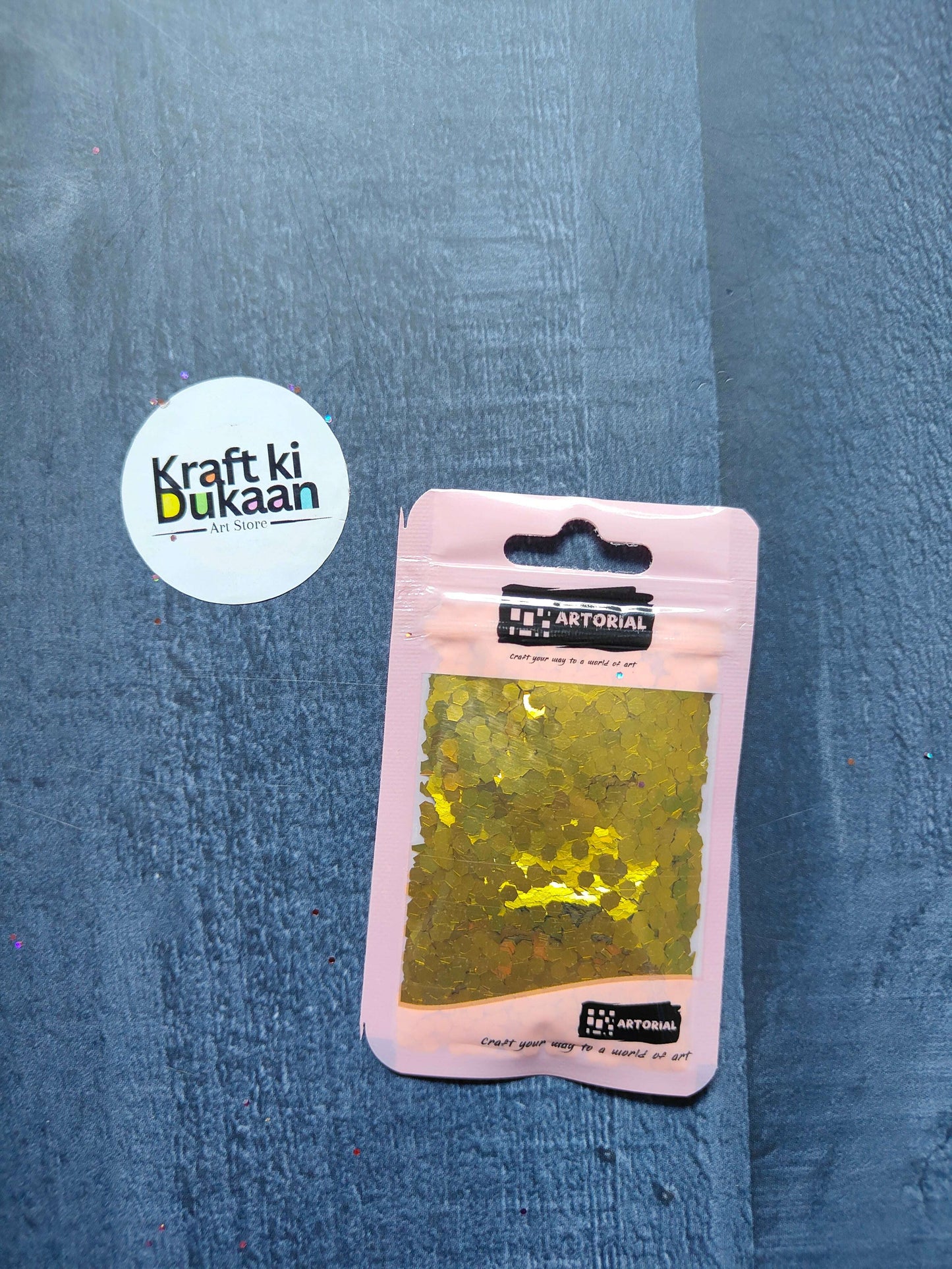 Glitter Shapes Sequins pack, gold hex shapes in a pink pouch