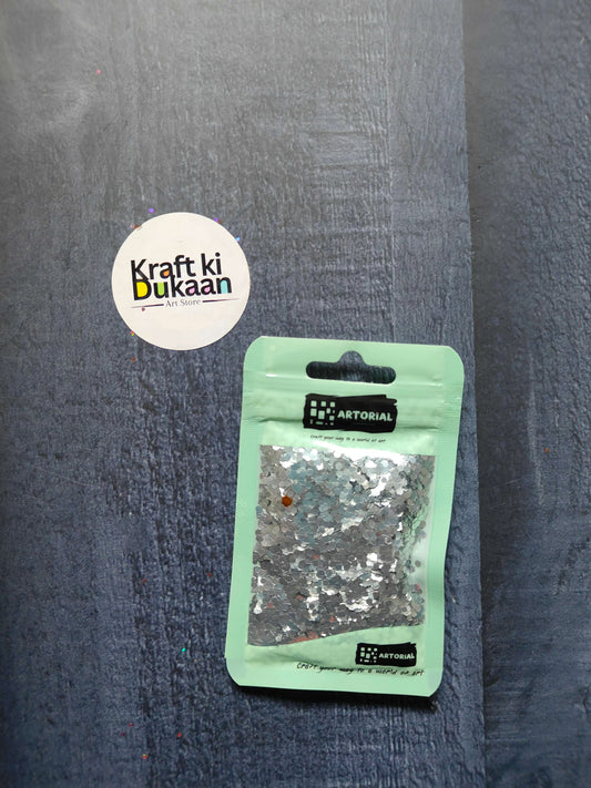 Glitter Shapes Sequins pack, silver hex shapes in a mint-green pouch