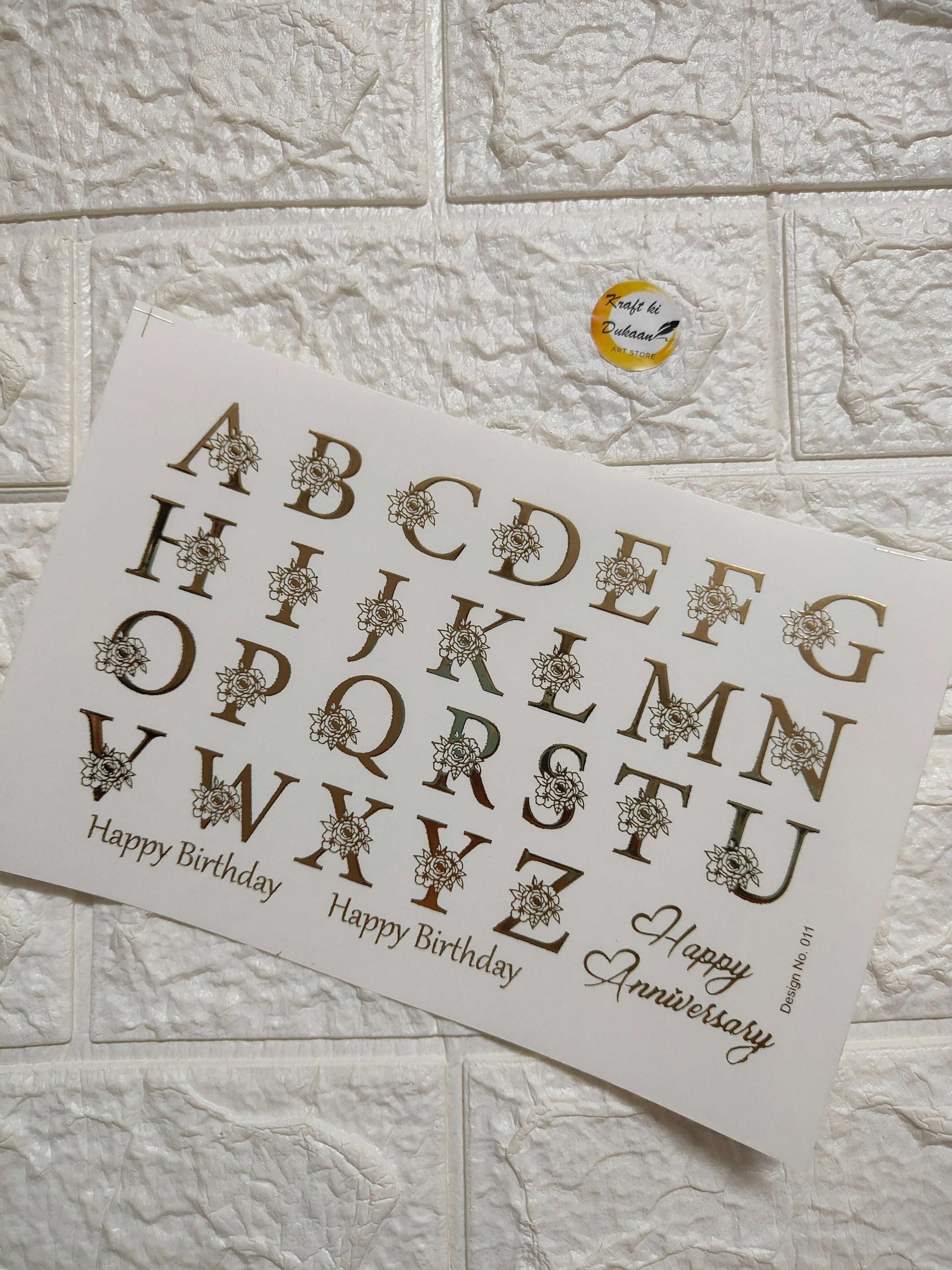 A5 gold embossed sticker sheet with decorative alphabet letters and birthday messages