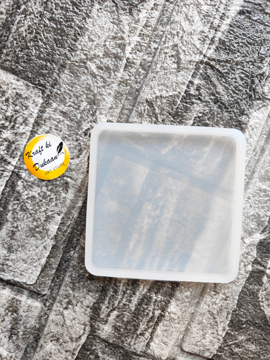 3 inch square mold for resin by Kraft ki Dukaan placed on a textured stone surface