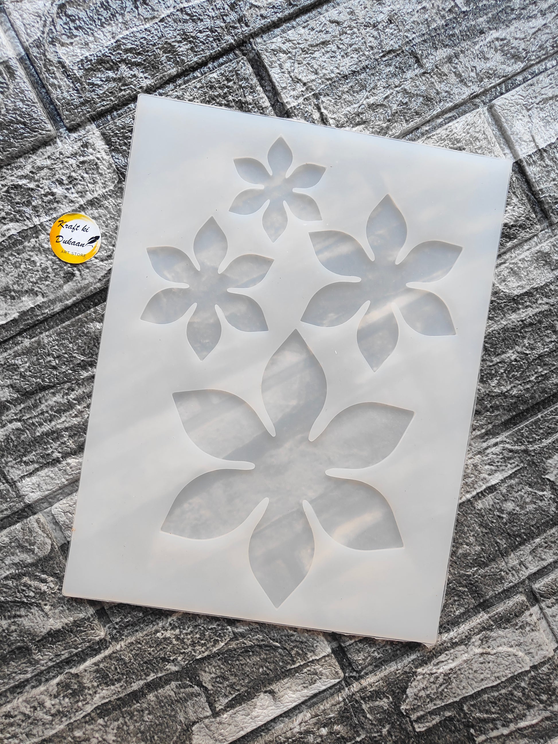 Silicone 4 cavity flower mold with four distinct flower shapes for baking and crafting projects