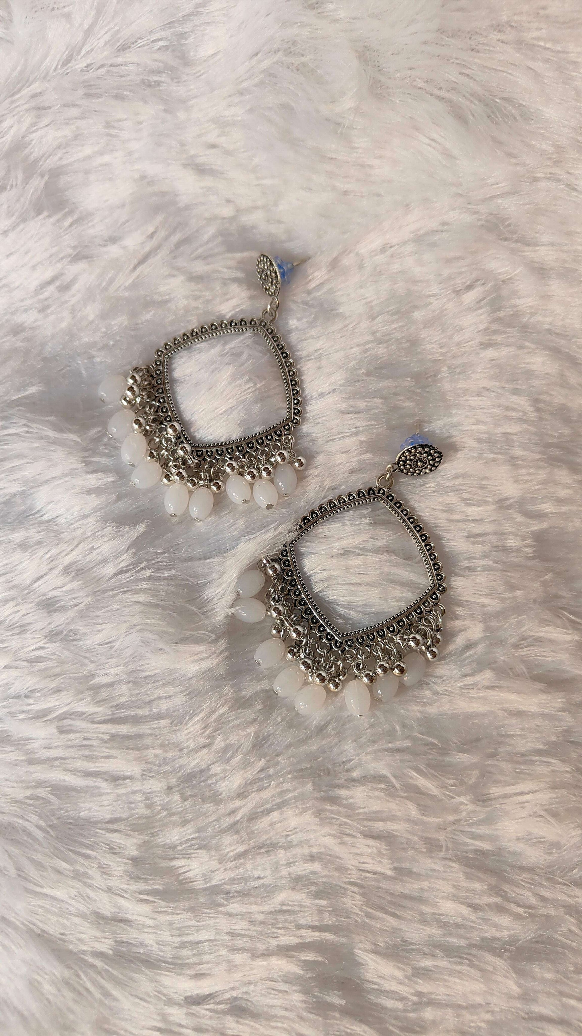 silver-jhumka-earrings-large-clear-beads