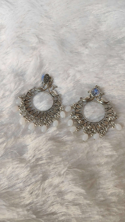 silver-jhumka-earrings-with-beads-angled-view