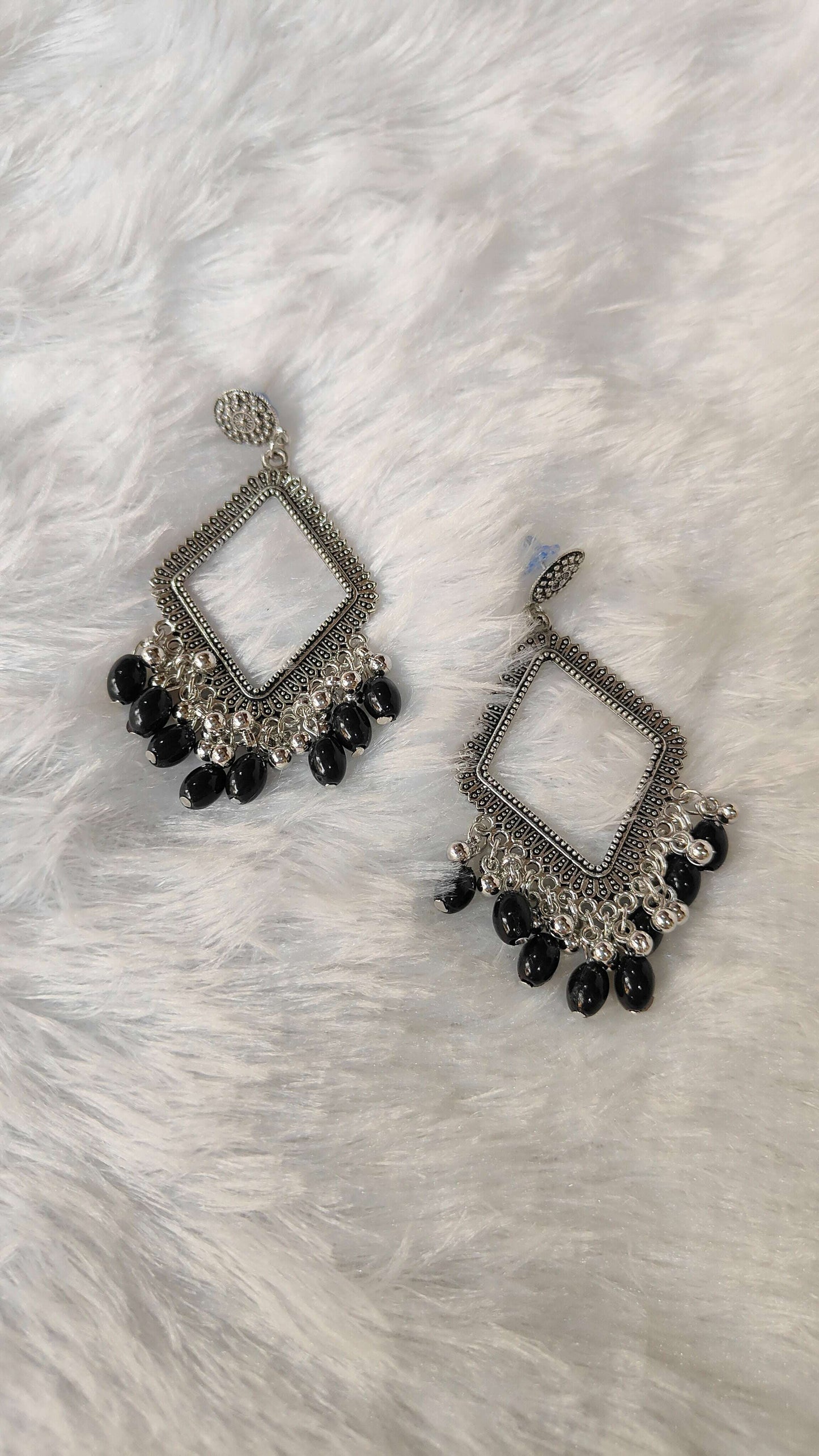 silver-jhumka-earrings-with-beads-black-dangle-design