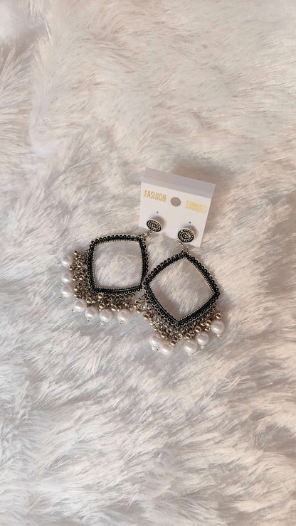 silver-jhumka-earrings-with-beads-black-gold-details