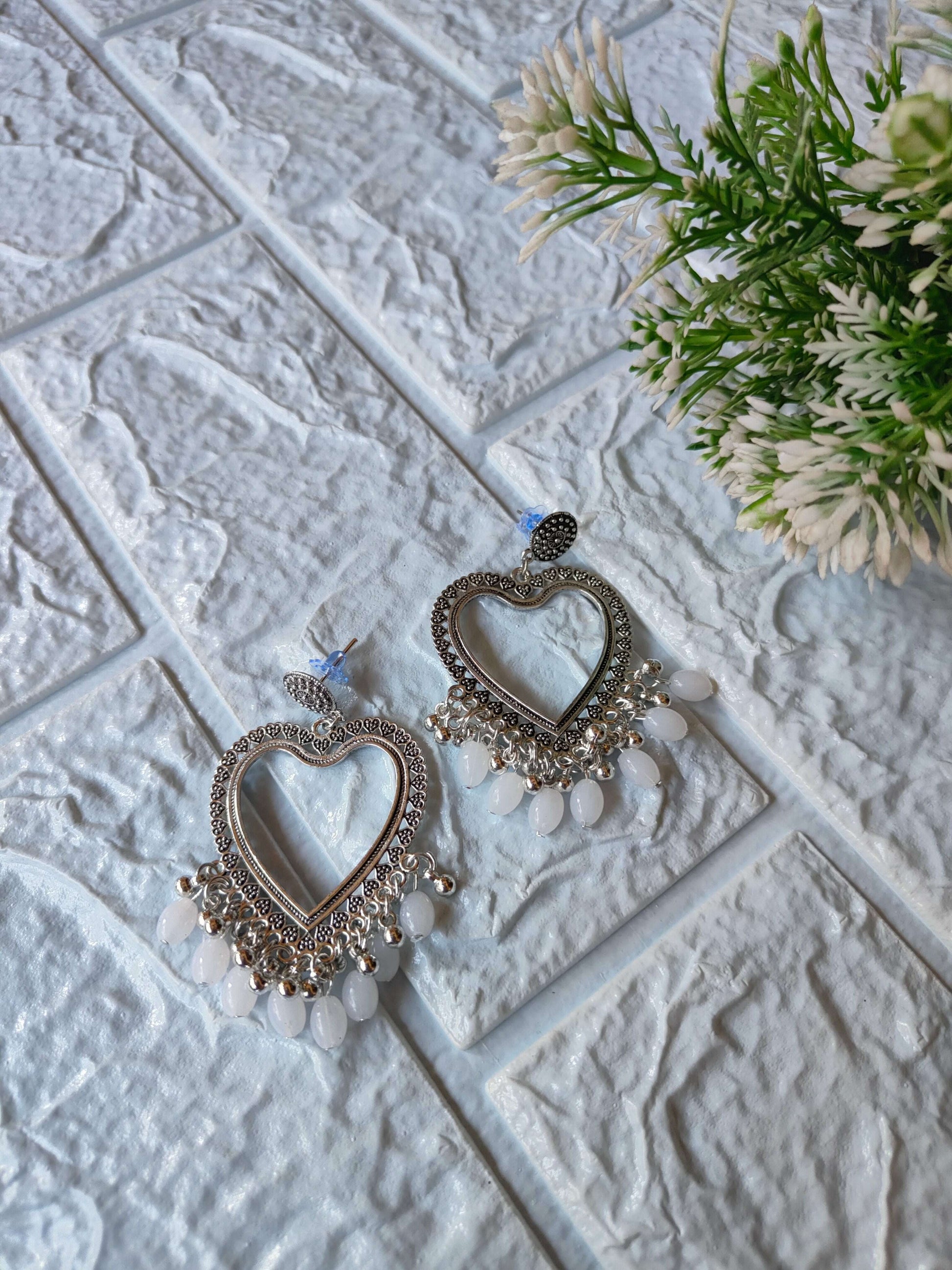 silver-jhumka-earrings-with-beads-heart-shape-1