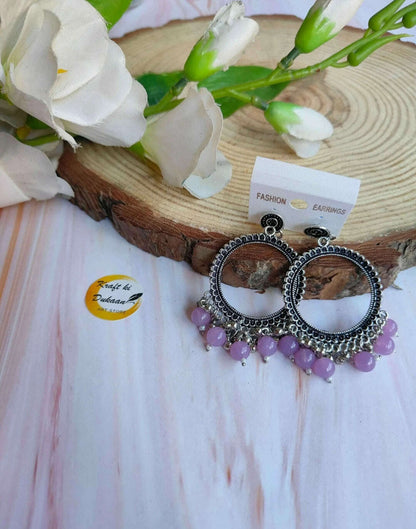 silver-jhumka-earrings-with-beads-purple