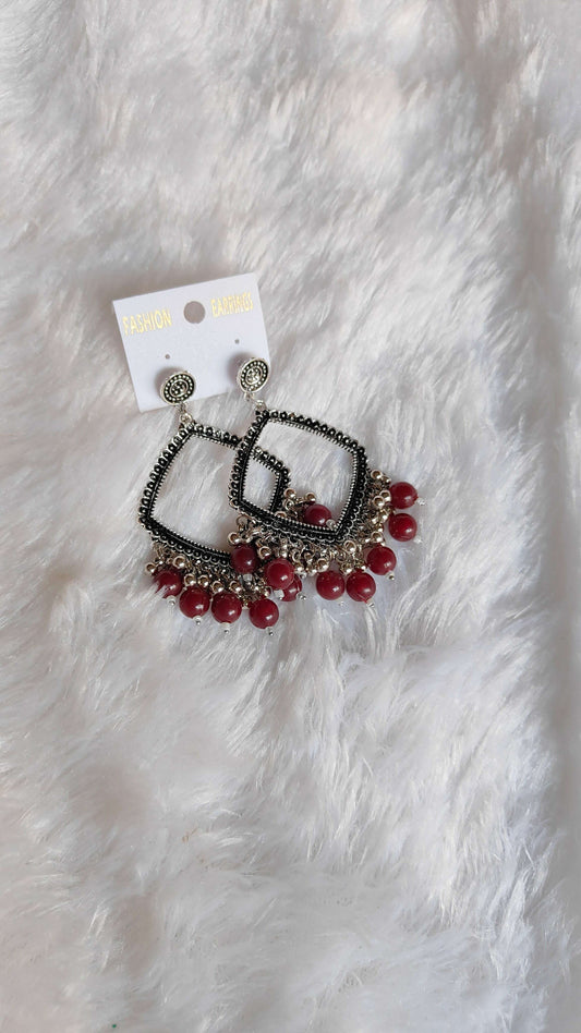 silver-jhumka-earrings-with-beads-red-beads-1