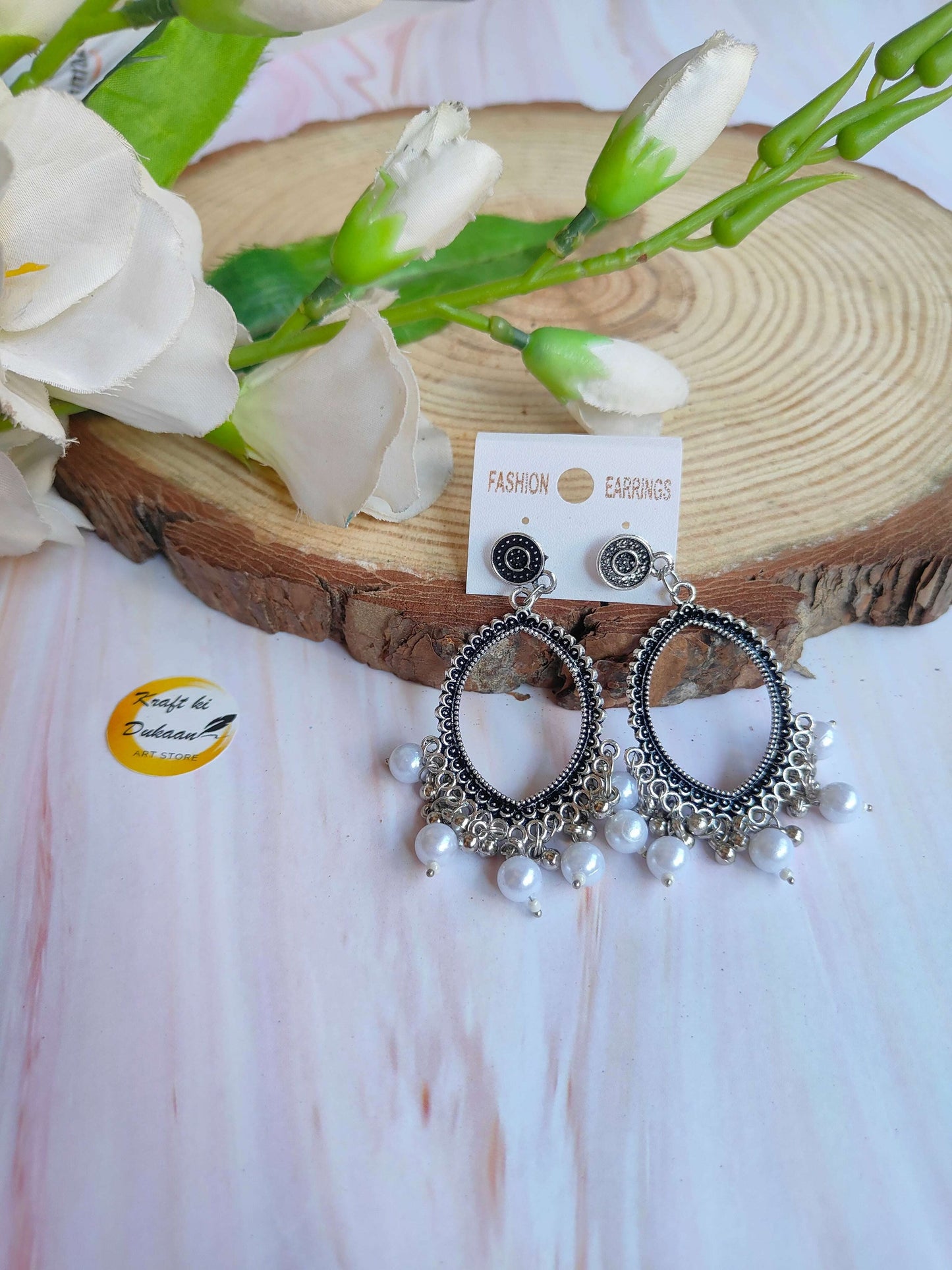silver-jhumka-earrings-with-beads-unique-design