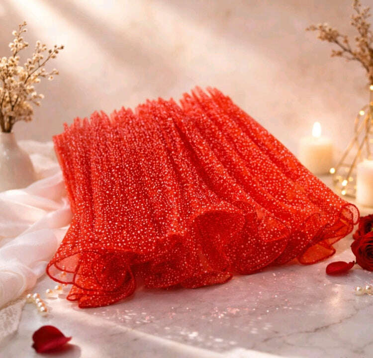 Snow wrapping paper net, red wrinkled mesh with glitter speckle texture