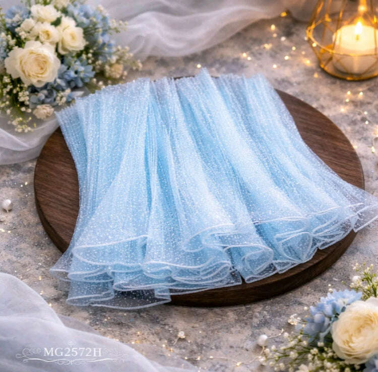 Snow wrapping paper net, light blue wrinkled mesh with glitter speckles