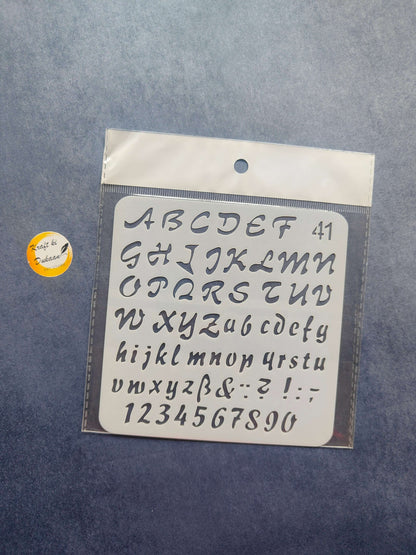 Stencil alphabet and symbols (A–Z, a–z, punctuation), Design 41