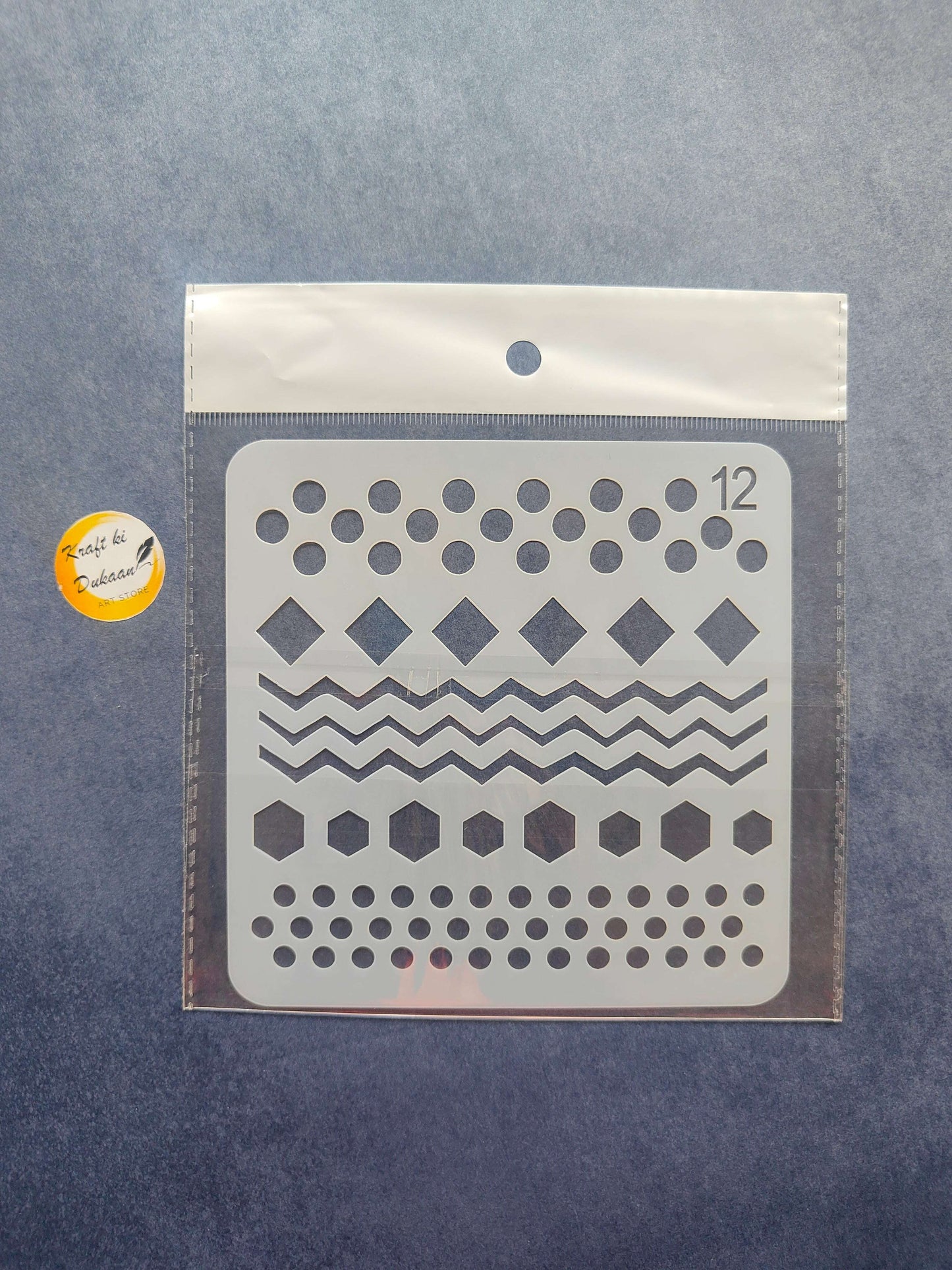 Stencil S12 with diamond row, wavy zigzag stripes, and dotted/hexagon cutouts