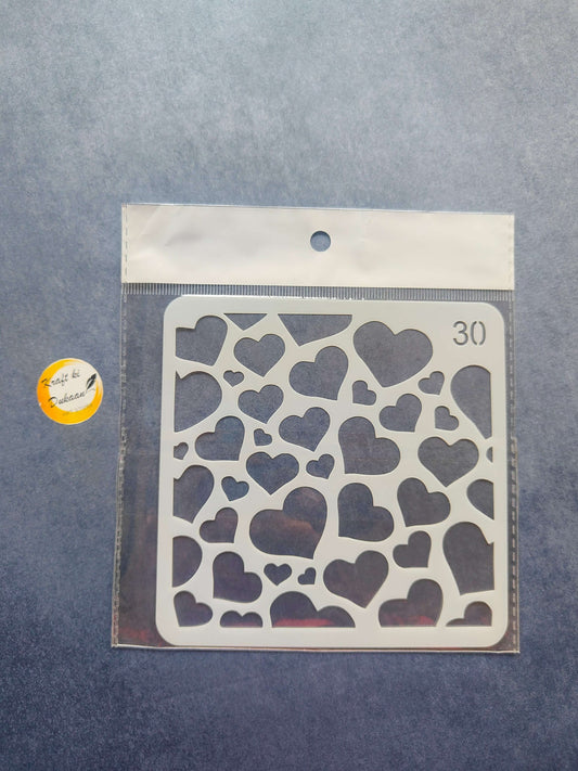 Heart-shaped stencil for texture art, made of plastic, perfect for crafting and decor projects