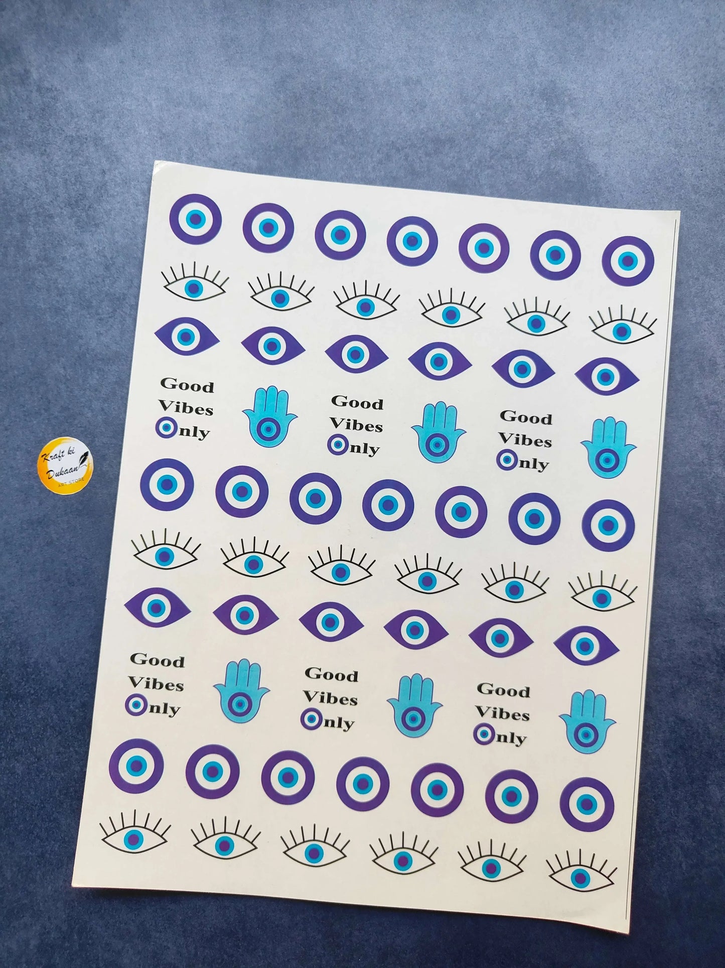 Color sticker sheet with blue eye, evil eye, and hand designs on A4