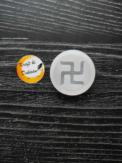 Swastik mould: round white silicone mold with swastika cutout