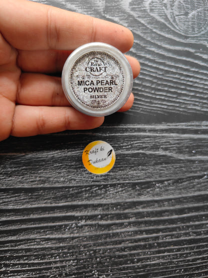 MICA pearl powder for resin in silver tin from Kraft ki Dukaan held in hand with label visible