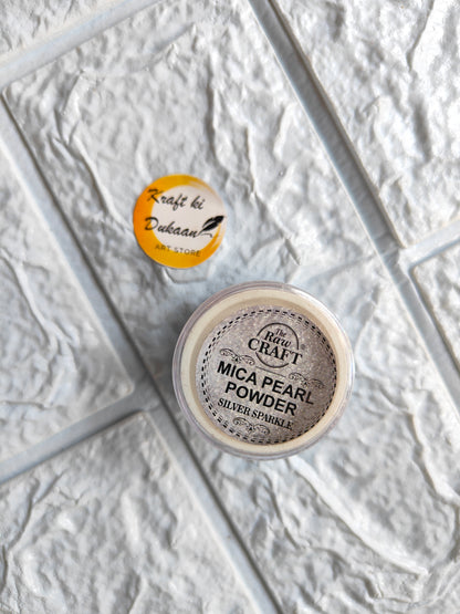 Kraft ki Dukaan MICA pearl powder for resin in a clear container with a silver sparkle finish