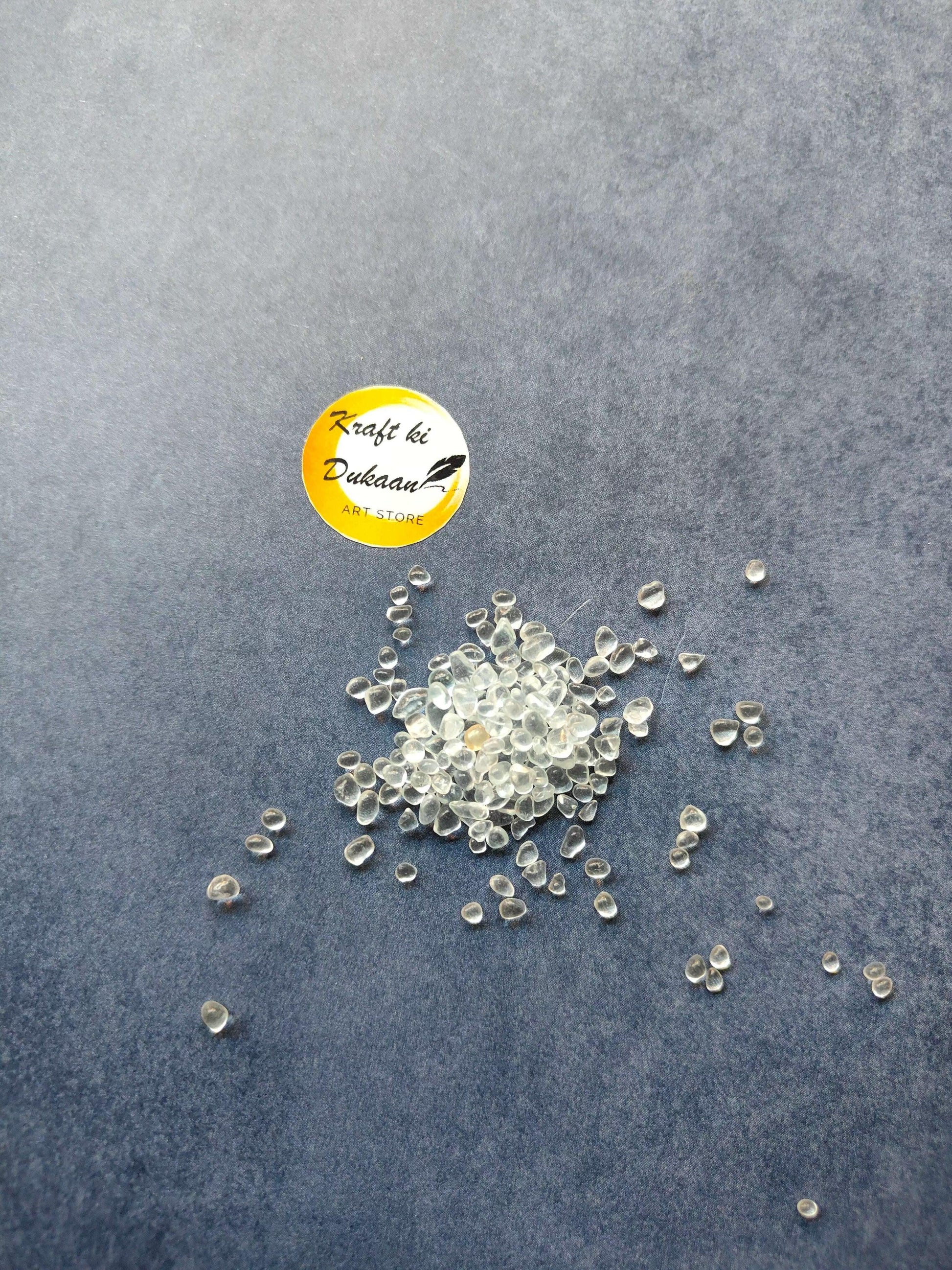 Transparent glass crystals, small clear bead pieces scattered