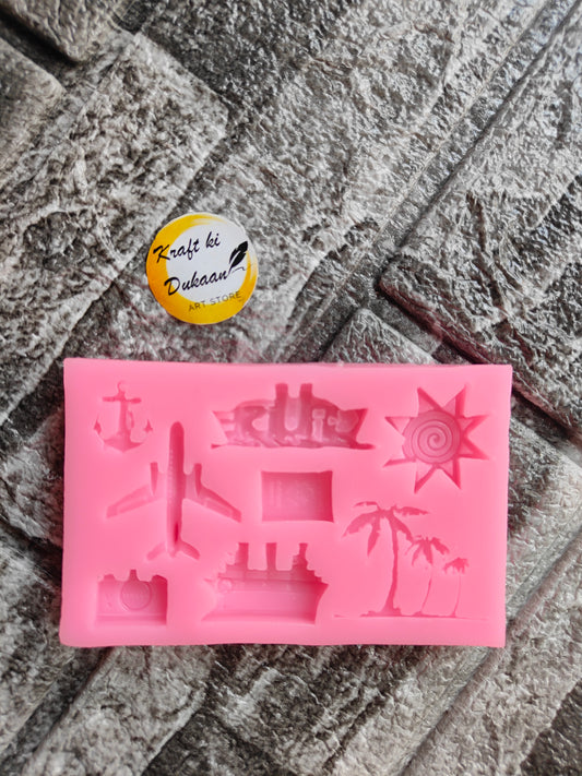 Pink travel design silicone mold with airplane, ship, palm tree, sun, and camera shapes by Kraft ki Dukaan