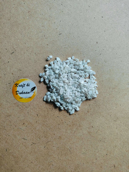 white-glass-colour-stones-for-crafts-pile-on-surface