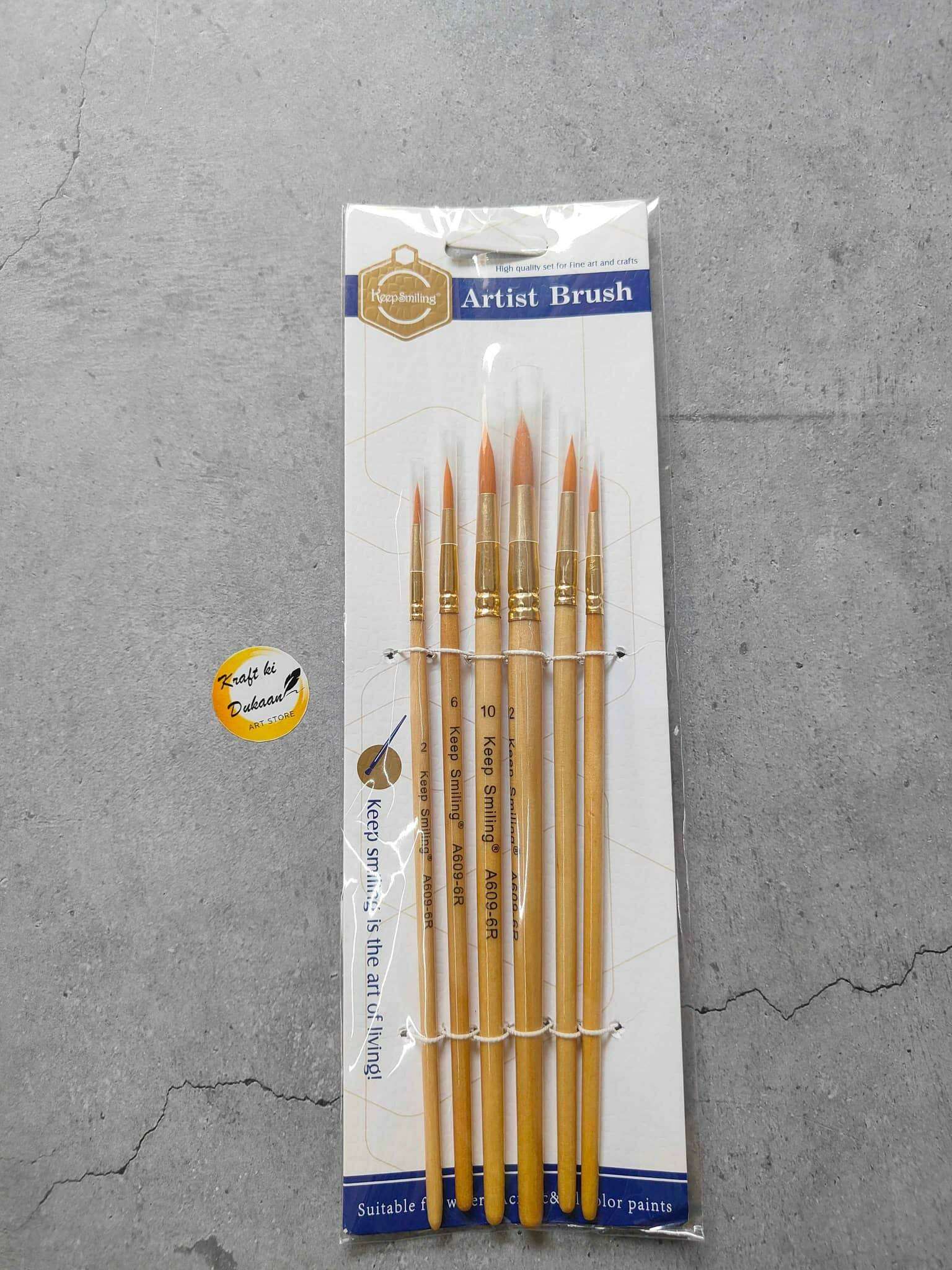 Paint brush set of 6 wooden-handled artist brushes, packaged.