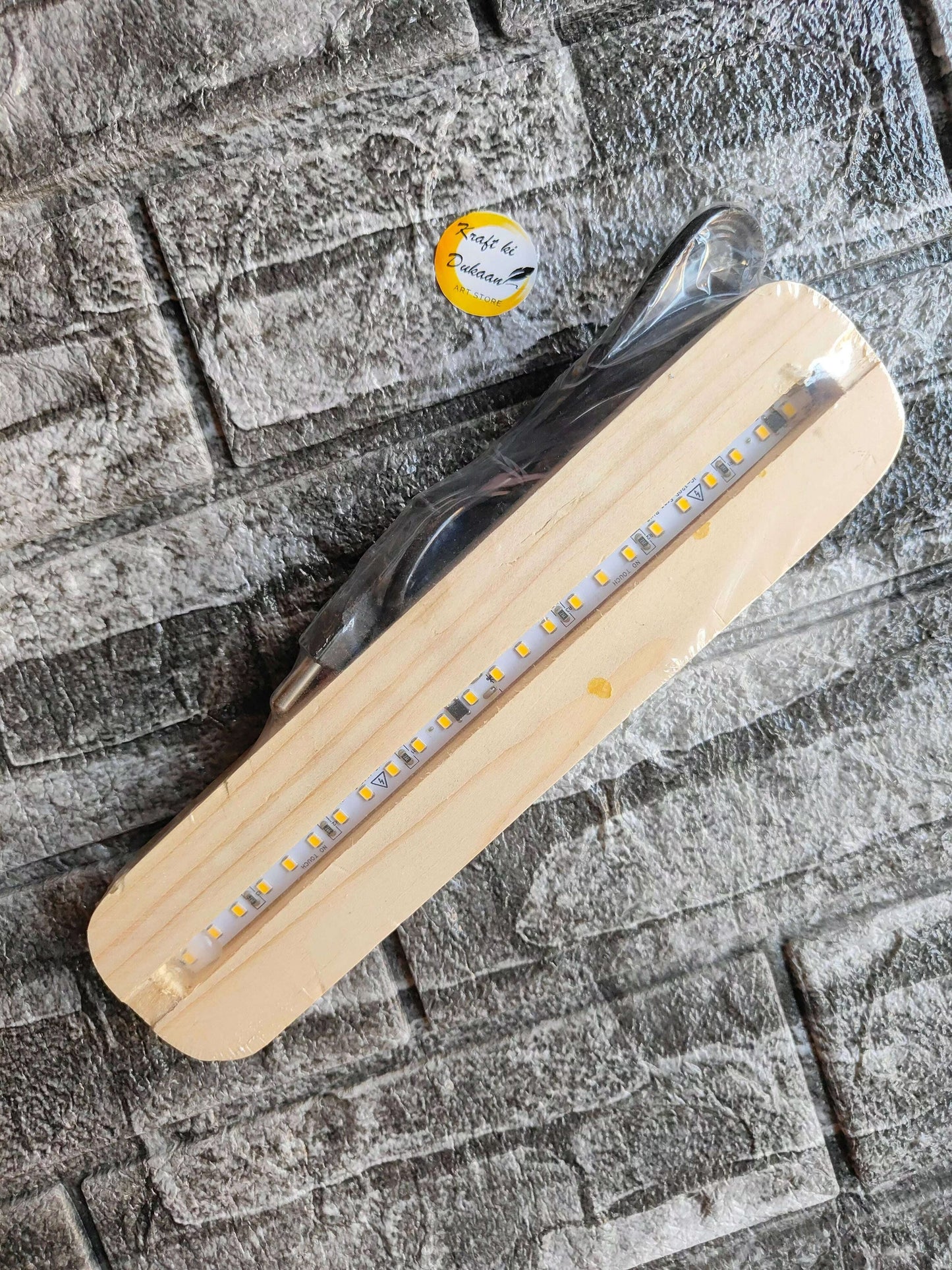 wooden-led-display-stand-sleek-shape-with-cable