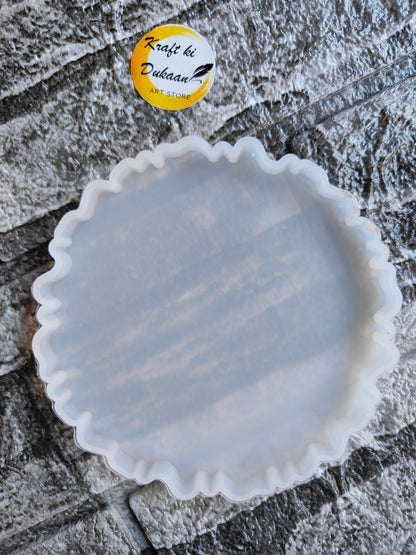 Clear zigzag silicone resin mould with wavy edges from Kraft ki Dukaan on textured background